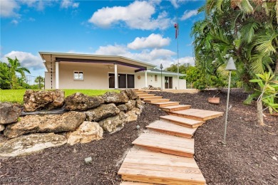 Welcome to waterfront living at its finest! Strategically on Whiskey Creek Country Club in Florida - for sale on GolfHomes.com, golf home, golf lot