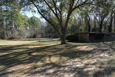Discover the charm of this spacious 3050 sq ft executive brick on Quail Hallow Golf Course in Mississippi - for sale on GolfHomes.com, golf home, golf lot