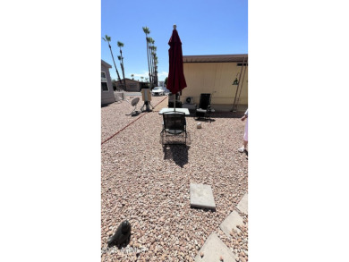 Looking for a ground set with everything done for you? This is on Sun City Riverview Golf Course in Arizona - for sale on GolfHomes.com, golf home, golf lot