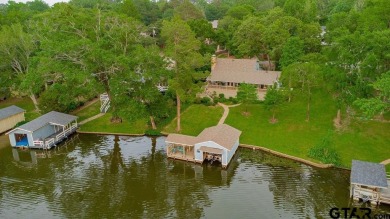 Welcome to your dream home in the serene community of Hideaway on Hide-A-Way Lake Golf Course in Texas - for sale on GolfHomes.com, golf home, golf lot