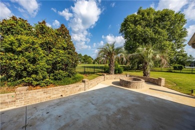 Discover luxury living at its finest in this custom-built home on Red Eagle Golf Course in Alabama - for sale on GolfHomes.com, golf home, golf lot