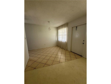 NO AGE RESTRICTION IN THIS BUILDING, WASHER AND DRYER INSIDE on The American Golf Club in Florida - for sale on GolfHomes.com, golf home, golf lot