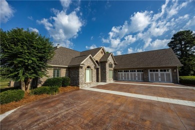 Discover luxury living at its finest in this custom-built home on Red Eagle Golf Course in Alabama - for sale on GolfHomes.com, golf home, golf lot