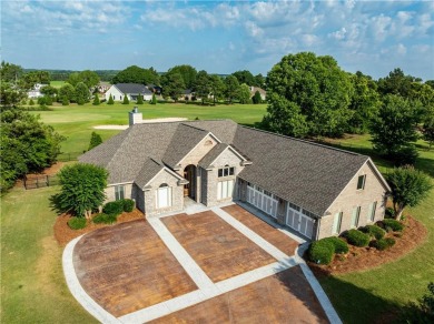 Discover luxury living at its finest in this custom-built home on Red Eagle Golf Course in Alabama - for sale on GolfHomes.com, golf home, golf lot