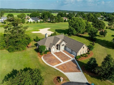 Discover luxury living at its finest in this custom-built home on Red Eagle Golf Course in Alabama - for sale on GolfHomes.com, golf home, golf lot