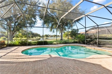 Experience Florida living at its finest in this beautifully on Estero Country Club in Florida - for sale on GolfHomes.com, golf home, golf lot