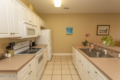 Incredibly well-maintained top floor condo overlooking the golf on Sea Trail Golf Resort in North Carolina - for sale on GolfHomes.com, golf home, golf lot