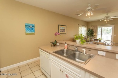 Incredibly well-maintained top floor condo overlooking the golf on Sea Trail Golf Resort in North Carolina - for sale on GolfHomes.com, golf home, golf lot