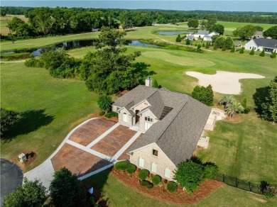 Discover luxury living at its finest in this custom-built home on Red Eagle Golf Course in Alabama - for sale on GolfHomes.com, golf home, golf lot