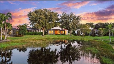 Experience Florida living at its finest in this beautifully on Estero Country Club in Florida - for sale on GolfHomes.com, golf home, golf lot