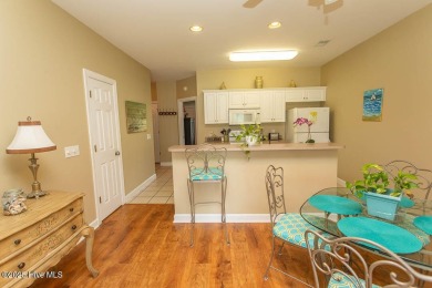 Incredibly well-maintained top floor condo overlooking the golf on Sea Trail Golf Resort in North Carolina - for sale on GolfHomes.com, golf home, golf lot