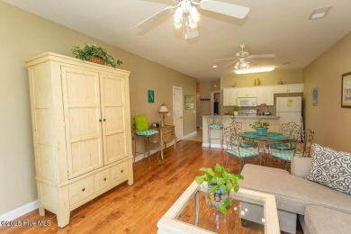 Incredibly well-maintained top floor condo overlooking the golf on Sea Trail Golf Resort in North Carolina - for sale on GolfHomes.com, golf home, golf lot