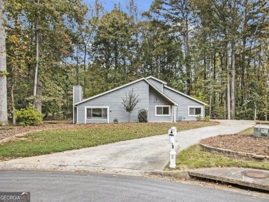 Perfectly located! This lovely home backs up to White Oak Golf on Canongate On White Oak Golf Course in Georgia - for sale on GolfHomes.com, golf home, golf lot