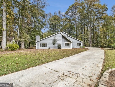 Perfectly located! This lovely home backs up to White Oak Golf on Canongate On White Oak Golf Course in Georgia - for sale on GolfHomes.com, golf home, golf lot