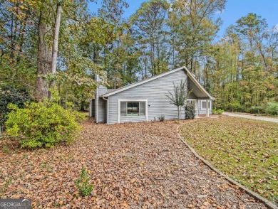 Perfectly located! This lovely home backs up to White Oak Golf on Canongate On White Oak Golf Course in Georgia - for sale on GolfHomes.com, golf home, golf lot