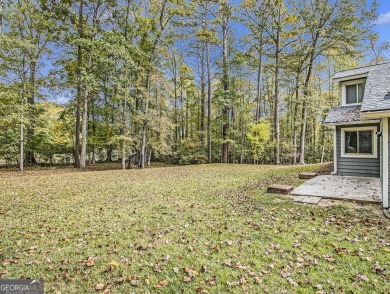 Perfectly located! This lovely home backs up to White Oak Golf on Canongate On White Oak Golf Course in Georgia - for sale on GolfHomes.com, golf home, golf lot