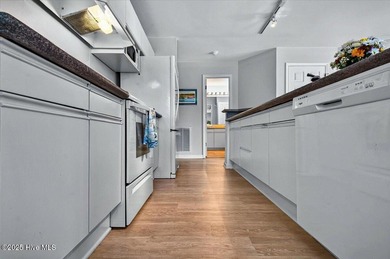 Gorgeous coastal condo in Colony I, the ''hidden gem'' of the on Oyster Bay Golf Links in North Carolina - for sale on GolfHomes.com, golf home, golf lot