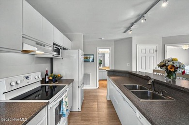 Gorgeous coastal condo in Colony I, the ''hidden gem'' of the on Oyster Bay Golf Links in North Carolina - for sale on GolfHomes.com, golf home, golf lot