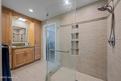 Welcome to your dream escape on the water! Nestled on wooded 2 on River Bend Golf and Country Club in North Carolina - for sale on GolfHomes.com, golf home, golf lot