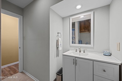 Welcome to your dream escape on the water! Nestled on wooded 2 on River Bend Golf and Country Club in North Carolina - for sale on GolfHomes.com, golf home, golf lot