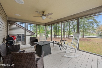 Welcome to your dream escape on the water! Nestled on wooded 2 on River Bend Golf and Country Club in North Carolina - for sale on GolfHomes.com, golf home, golf lot