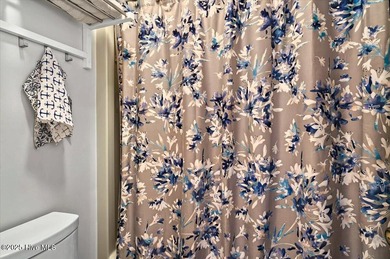 Gorgeous coastal condo in Colony I, the ''hidden gem'' of the on Oyster Bay Golf Links in North Carolina - for sale on GolfHomes.com, golf home, golf lot