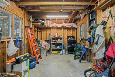 Welcome to your dream escape on the water! Nestled on wooded 2 on River Bend Golf and Country Club in North Carolina - for sale on GolfHomes.com, golf home, golf lot