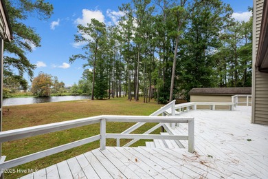 Welcome to your dream escape on the water! Nestled on wooded 2 on River Bend Golf and Country Club in North Carolina - for sale on GolfHomes.com, golf home, golf lot