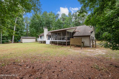 Welcome to your dream escape on the water! Nestled on wooded 2 on River Bend Golf and Country Club in North Carolina - for sale on GolfHomes.com, golf home, golf lot