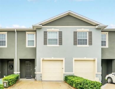 This Atria at Ridgewood Lakes contemporary two-story townhome is on Ridgewood Lakes Golf and Country Club in Florida - for sale on GolfHomes.com, golf home, golf lot