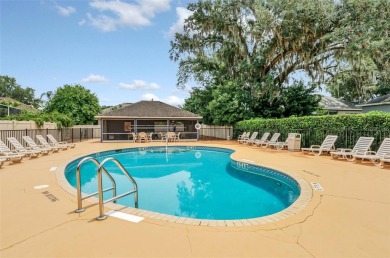 This Atria at Ridgewood Lakes contemporary two-story townhome is on Ridgewood Lakes Golf and Country Club in Florida - for sale on GolfHomes.com, golf home, golf lot