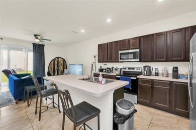 This Atria at Ridgewood Lakes contemporary two-story townhome is on Ridgewood Lakes Golf and Country Club in Florida - for sale on GolfHomes.com, golf home, golf lot