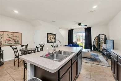 This Atria at Ridgewood Lakes contemporary two-story townhome is on Ridgewood Lakes Golf and Country Club in Florida - for sale on GolfHomes.com, golf home, golf lot