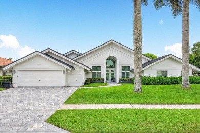 Welcome to your dream home! This beautifully renovated property on Bocaire Country Club in Florida - for sale on GolfHomes.com, golf home, golf lot