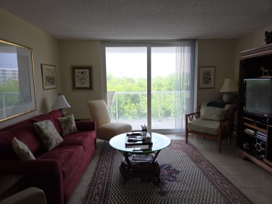 Rarely available 2/2 condo with 3 deeded parking spaces in one on Palm Beach Par-3 Golf Course in Florida - for sale on GolfHomes.com, golf home, golf lot