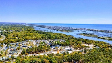 Gorgeous coastal condo in Colony I, the ''hidden gem'' of the on Oyster Bay Golf Links in North Carolina - for sale on GolfHomes.com, golf home, golf lot