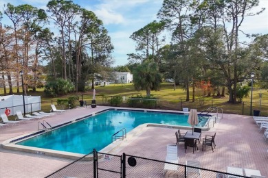 PRICE TO SELL!!! Holiday Park: A 55+ GATED COMMUNITY. CORNER LOT on Sabal Trace Golf and Country Club in Florida - for sale on GolfHomes.com, golf home, golf lot