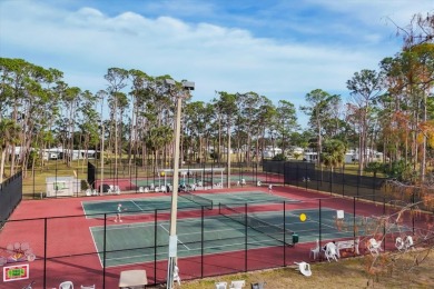 PRICE TO SELL!!! Holiday Park: A 55+ GATED COMMUNITY. CORNER LOT on Sabal Trace Golf and Country Club in Florida - for sale on GolfHomes.com, golf home, golf lot