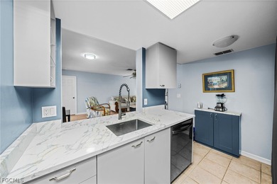 Take in serene water views and embrace the Southwest Florida on Cross Creek Country Club in Florida - for sale on GolfHomes.com, golf home, golf lot