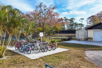 PRICE TO SELL!!! Holiday Park: A 55+ GATED COMMUNITY. CORNER LOT on Sabal Trace Golf and Country Club in Florida - for sale on GolfHomes.com, golf home, golf lot