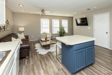 Discover this beautifully maintained townhome in a prime West on Des Moines Golf and Country Club in Iowa - for sale on GolfHomes.com, golf home, golf lot