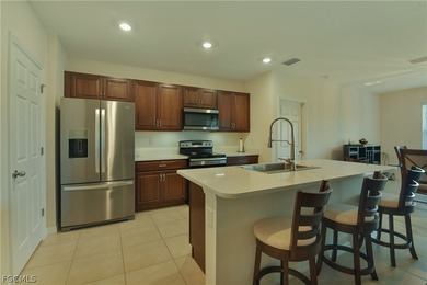 NEWER 3BR/2BA HOME WITH TERRIFIC CENTER OF LAKE VIEW & WATER on Herons Glen Golf and Country Club in Florida - for sale on GolfHomes.com, golf home, golf lot