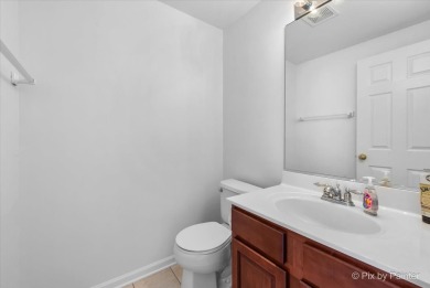Welcome to this move-in ready 3-bedroom, 2.1-bath townhome in on Cary Country Club in Illinois - for sale on GolfHomes.com, golf home, golf lot