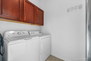 Welcome to this move-in ready 3-bedroom, 2.1-bath townhome in on Cary Country Club in Illinois - for sale on GolfHomes.com, golf home, golf lot