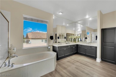 Modern elegance featuring fine finishes, a sparkling blue quartz on Rhodes Ranch Golf Club in Nevada - for sale on GolfHomes.com, golf home, golf lot