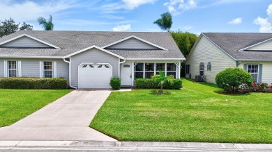 NO NEED TO WORRY ABOUT YOUR ROOF HERE - IT IS COVERED BY THE HOA on Gator Trace Golf and Country Club in Florida - for sale on GolfHomes.com, golf home, golf lot