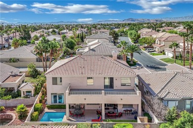 Modern elegance featuring fine finishes, a sparkling blue quartz on Rhodes Ranch Golf Club in Nevada - for sale on GolfHomes.com, golf home, golf lot