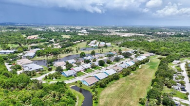NO NEED TO WORRY ABOUT YOUR ROOF HERE - IT IS COVERED BY THE HOA on Gator Trace Golf and Country Club in Florida - for sale on GolfHomes.com, golf home, golf lot