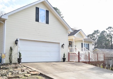 Welcome to your dream home located on the 15th tee box of Indian on Mountain Ranch Golf Club in Arkansas - for sale on GolfHomes.com, golf home, golf lot