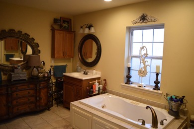 Welcome to your dream home located on the 15th tee box of Indian on Mountain Ranch Golf Club in Arkansas - for sale on GolfHomes.com, golf home, golf lot